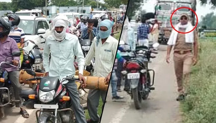 दिल्ली-पलिया स्टेट हाईवे पर लगा जाम, बिना मास्क के जाम खुलवाने पहुंची पुलिस