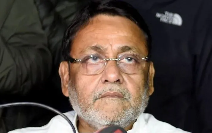 राकांपा का मलिक के विभागों को अन्य मंत्रियों को सौंपने का निर्णय ,इस्तीफे से इनकार