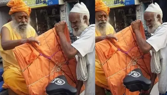 अयोध्या: भगवाधारी साधु और मुस्लिम रिक्शेवाले की तस्वीर वायरल, फोटो दे रही यह संदेश