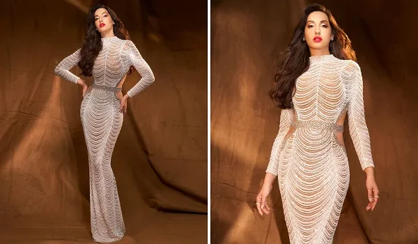 Nora Fatehi Photos : सिल्‍वर ड्रेस में कमर लचकाती नजर आईं नोरा फतेही, इंटरनेट पर मची खलबली