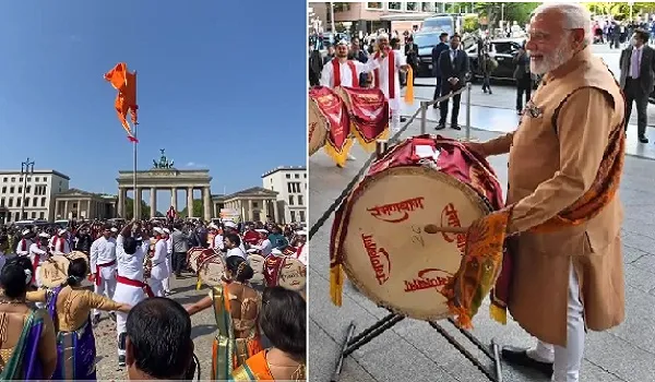 PM Modi In Germany : बर्लिन में पीएम मोदी के स्वागत में लहराया गया भगवा झंडा, कांग्रेस ने पूछा- तिरंगा कहां है?