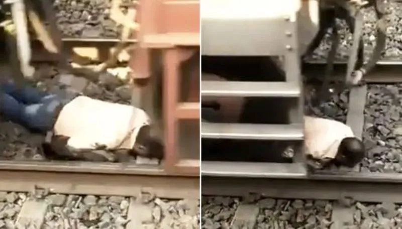 Video: रेल की पटरी के नीचे से निकल रहा था शख्स, अचानक चल दी ट्रेन, और फिर...