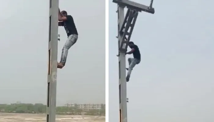Unnao : ट्रेन से उतरा सिरफिरा युवक OHE पोल पर चढ़ा, उतारने में पुलिसकर्मियों के छूटे पसीने, देखें- VIDEO