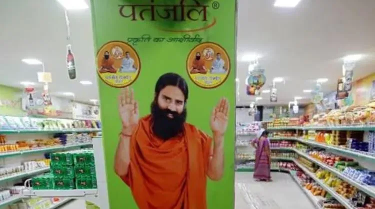 BSE और NSE ने पतंजलि फूड्स के प्रवर्तकों के शेयरों पर लगाई रोक, कंपनी ने कहा- इस फैसले का कामकाज पर कोई असर नहीं पड़ेगा
