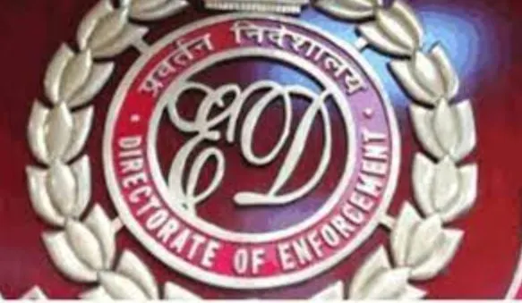 बंगाल स्कूल भर्ती घोटाला : ‘कालीघाट के चाचा’ के आवास पर ED ने मारा छापा