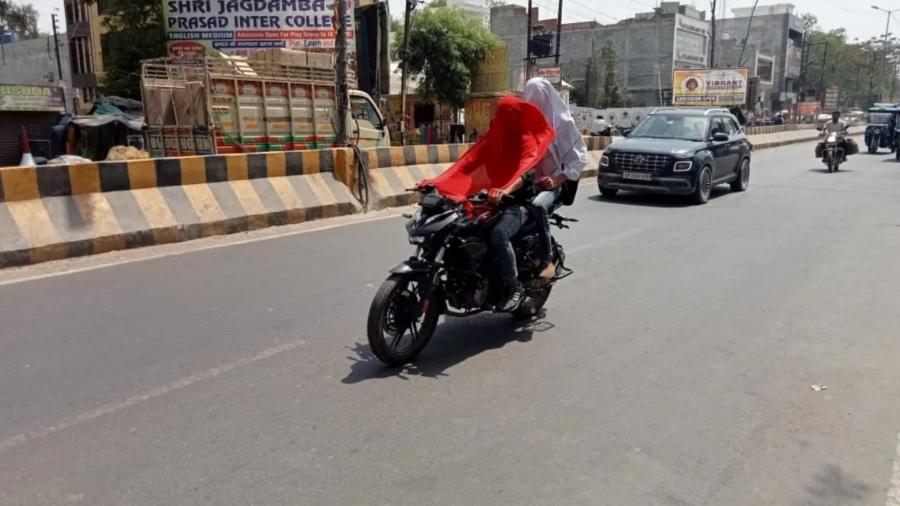 Unnao Weather Today: नौतपा खत्म लेकिन, मौसम में तपन जारी...शरीर को ढककर बाहर निकल रहे लोग