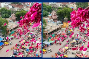 यूपी के प्रयागराज में कांवड़ियों पर हुई पुष्पवर्षा, CM के निर्देश पर सावन के तीसरे सोमवार को आसमान से हुआ अभिनंदन