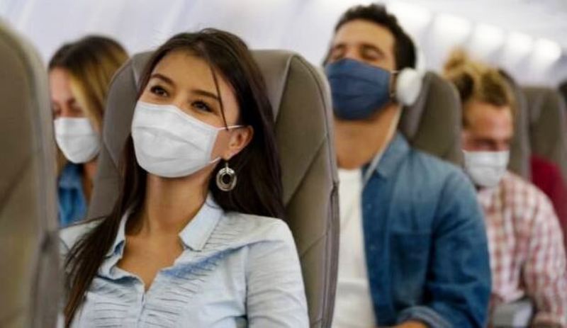 हवाई यात्रा के दौरान अब मास्क लगाना जरूरी नहीं, लेकिन... सरकार ने यात्रियों को दी ये सलाह