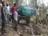 रुद्रपुर: गर्मी में वाटर होल्स भर रहा वन विभाग