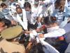 सिविल अस्पताल में स्वास्थ्य कर्मियों ने शासनादेश की प्रतियां जला कर किया विरोध प्रदर्शन
