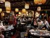 CHINA: बीजिंग में कोरोना पाबंदियों से मिली ढील, फिर से खोले गए रेस्तरां