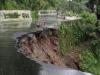 नैनीताल: बारिश का कहर - राजभवन रोड का आधा हिस्सा क्षतिग्रस्त, घरों के अंदर घुसा पानी