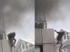 बहुमंजिला इमारत में लगी भीषण आग, छत की मंजिल से कूदा शख्स, दिल दहला देगा VIDEO