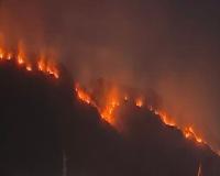 गरमपानी: हाईवे से सटी पहाड़ियों में आग धधकने से जोखिम दोगुना 