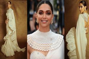 Cannes film festival: व्हाइट रफल साड़ी और पर्ल नेकलेस में Deepika Padukone लगीं बला की खूबसूरत, Red Carpet पर दिए कातिलाना पोज