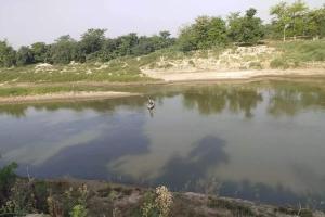 रामनगर: नदी में उतराता मिला अज्ञात युवक का शव
