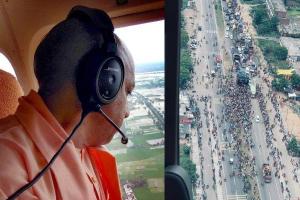 Kanwar Yatra 2022: मुख्यमंत्री योगी ने हेलीकॉप्टर से की कांवड़ियों पर पुष्पवर्षा, कांवड़ रूट का भी किया निरीक्षण