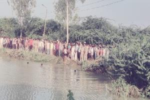 हमीरपुर : तालाब में डूबा अधेड़ पुलिस व गोताखोर कर रहे तलाश