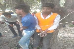 बाराबंकी: बच्ची से छेड़छाड़ का आरोप लगाकर दो बच्चों को पेड़ से बांधकर पीटा, दो गिरफ्तार