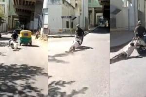 VIDEO : बोलेरो को टक्कर मार भागने लगा स्कूटी सवार, बुजुर्ग ने पीछे से पकड़ा तो काफी दूर तक घसीटा